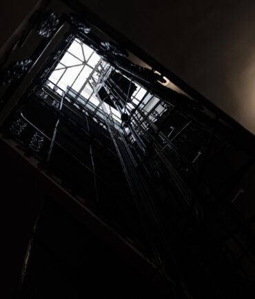 A shaft of an elevator from the inside shot from below
